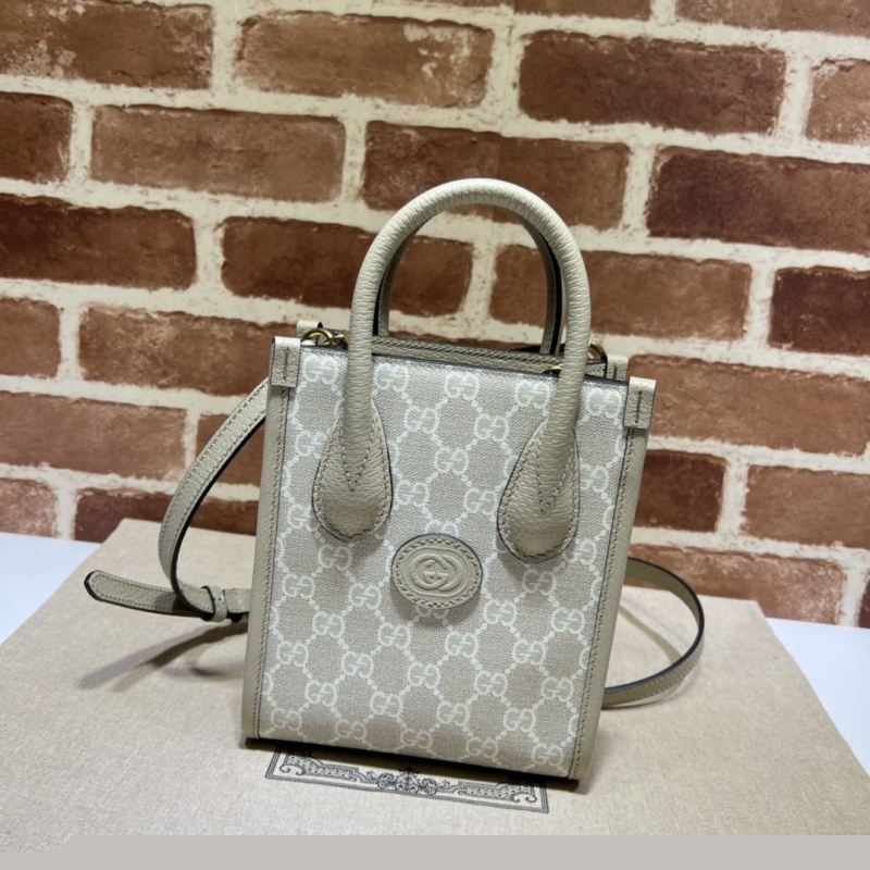 G*u*i top handle bags